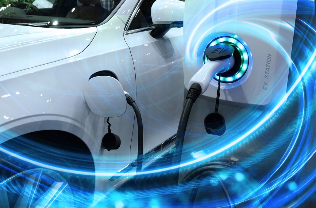 Ev,Car,Or,Electric,Vehicle,At,Charging,Station,With,The Electric Cars